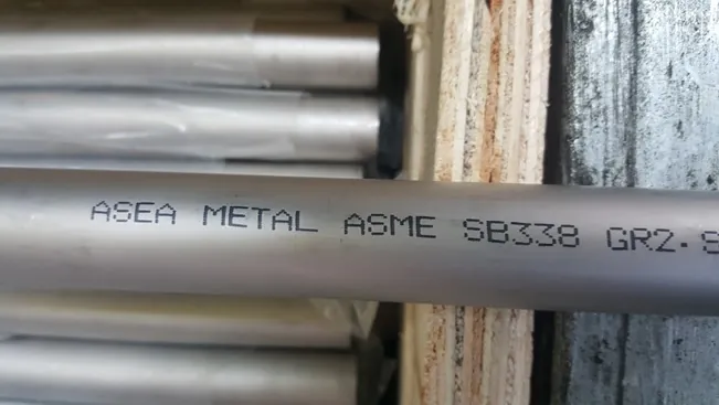 Tube body marking: ASEA METAL — ASME SB338 Grade 2